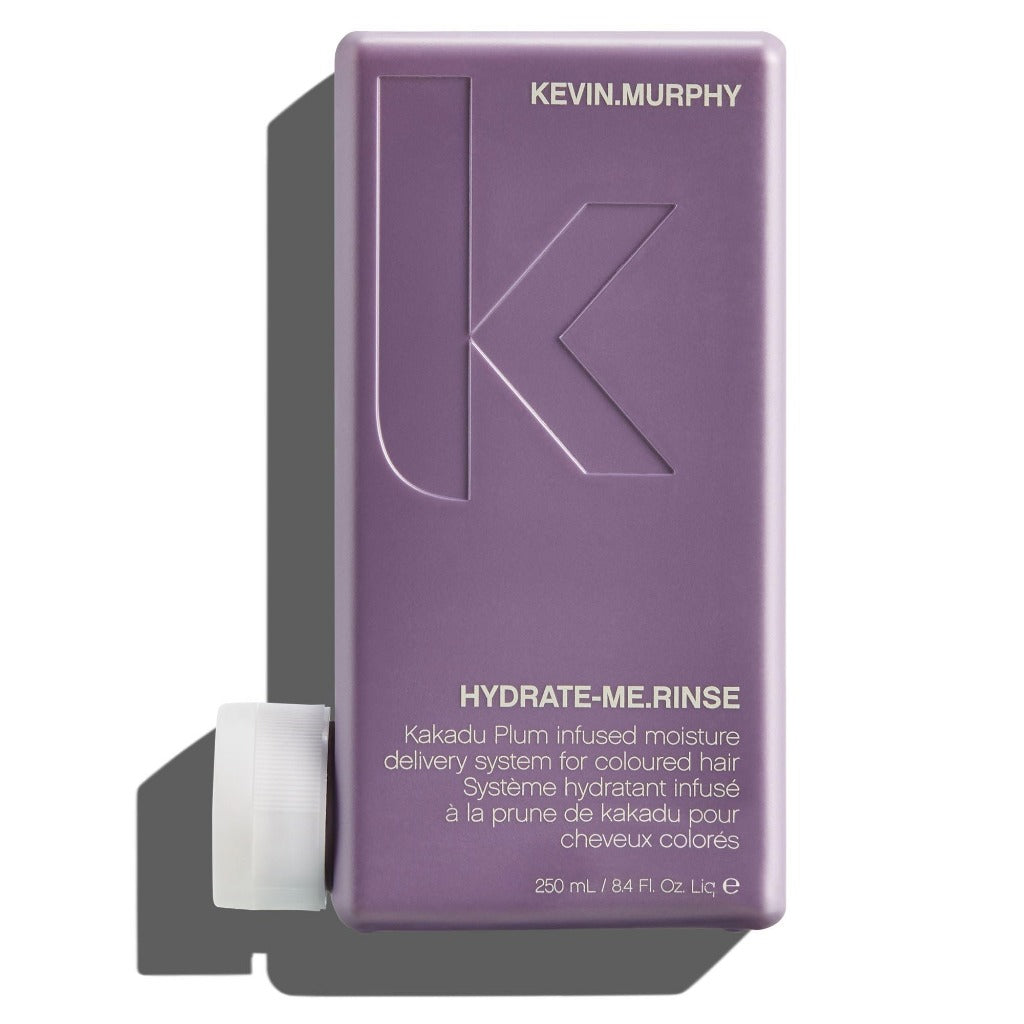 A bottle of Kevin Murphy's hydrate-me-rinse hair care.