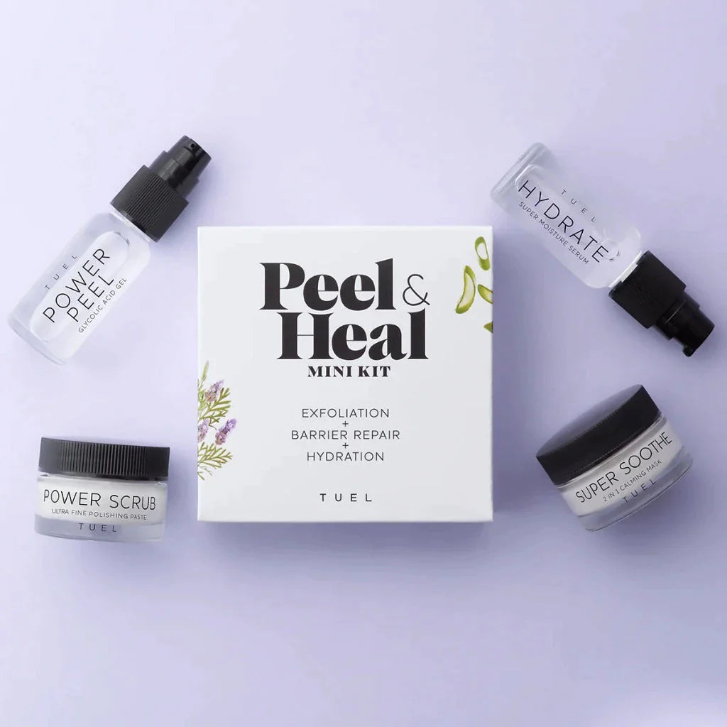 Tuel Skin Care's peel and heal mini kit surrounded by small bottles and jars.